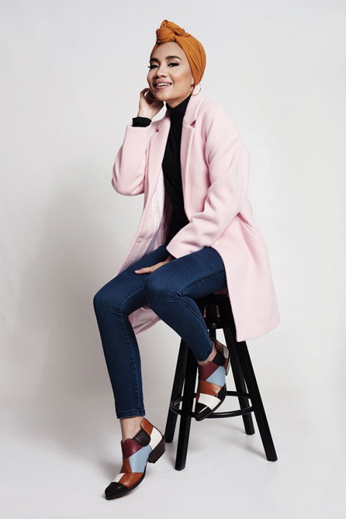 Yuna is a style icon noted for her conservative fashion choices